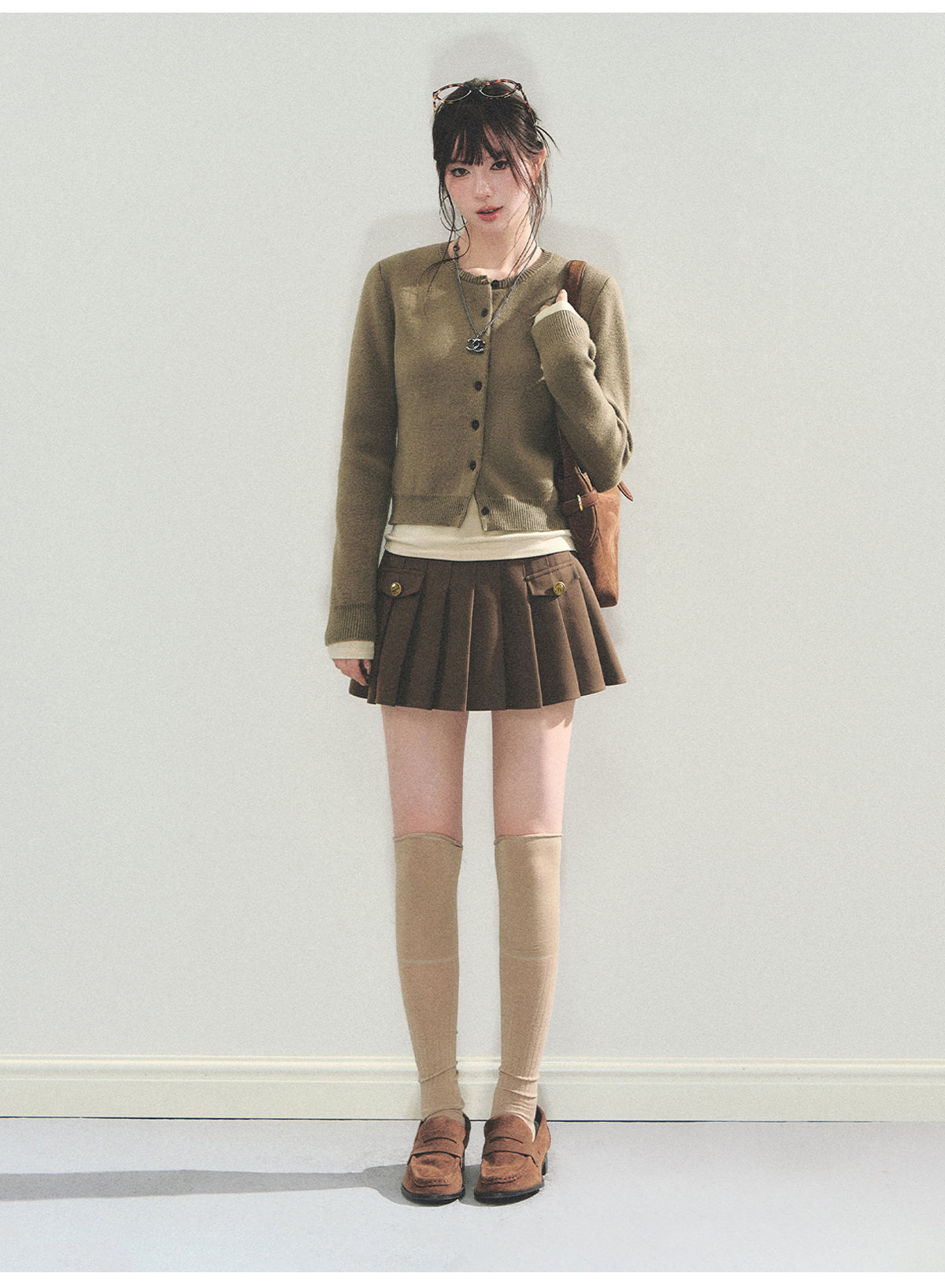College style faux pocket skirt A-line pleated skirt high waisted mini skirt classic smart tight high end AD1 ANDYET
