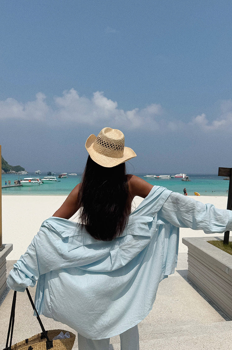 A loose and cool linen shirt and wide-leg pants set for women, perfect for a summer resort style in 2025. BEARUN SWIM