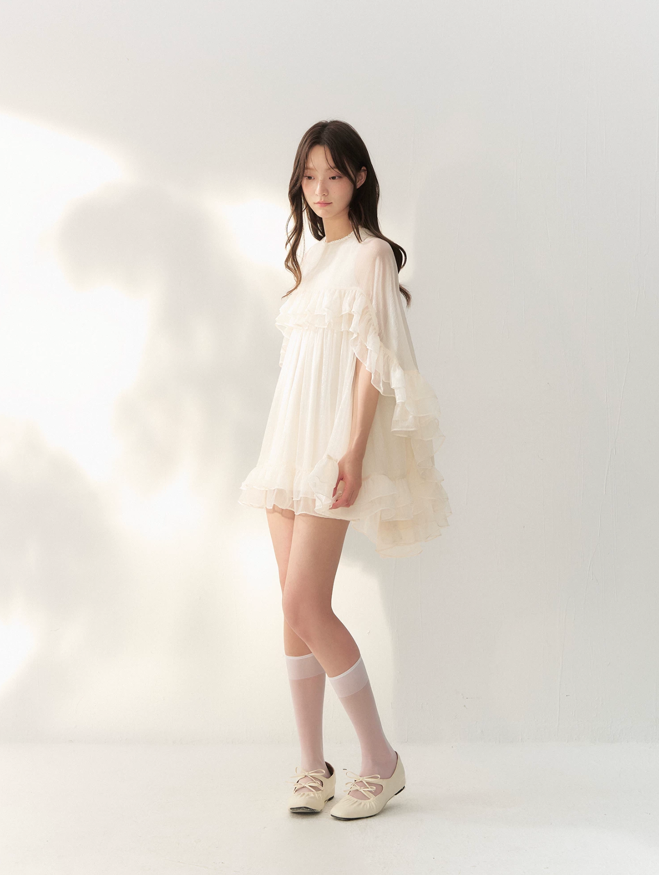 RECIT Classic French sleek beige dress with cape, layers of lace and beads, A-line silhouette.