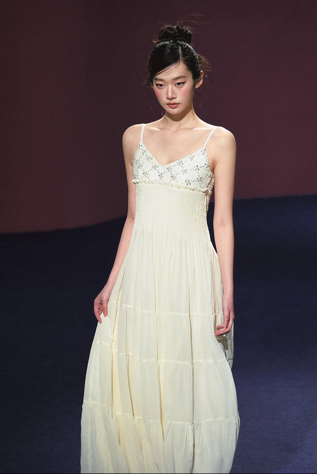 A white sequined V-neck dress in a holiday style.