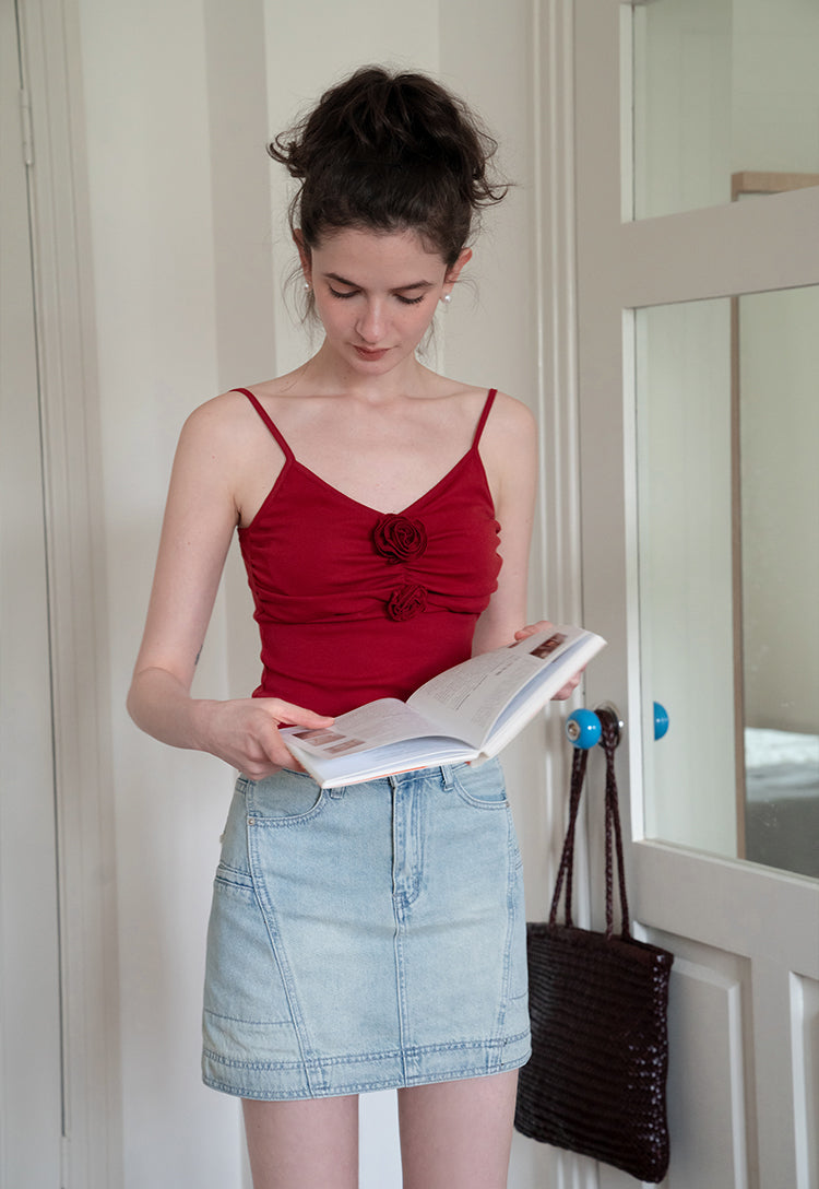 3D rose pleated camisole can be worn alone or with a slim-fit Eggka Cardigan