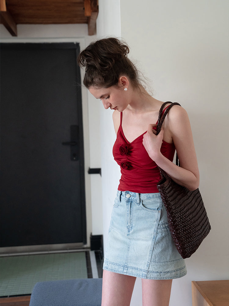 3D rose pleated camisole can be worn alone or with a slim-fit Eggka Cardigan