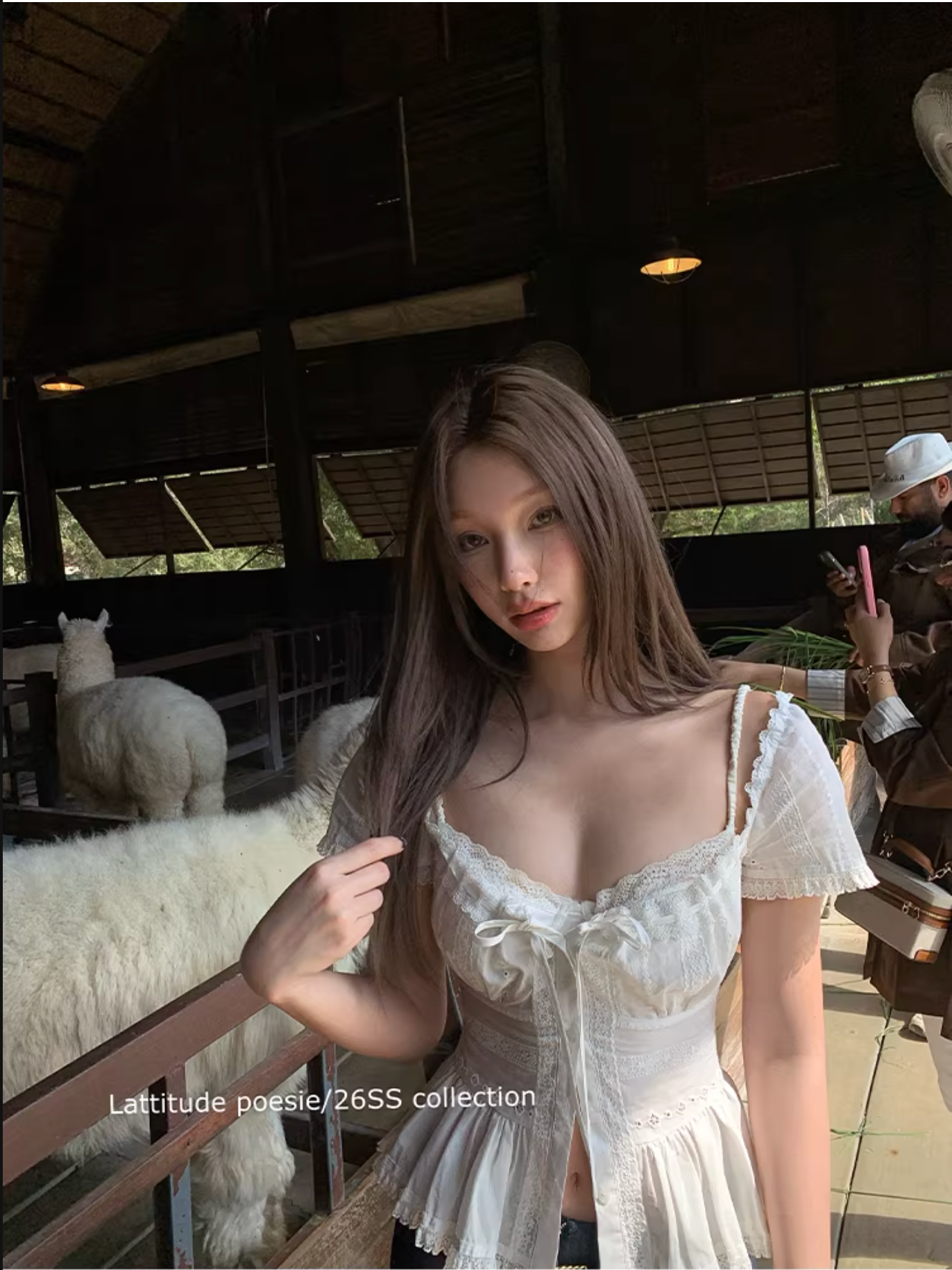 LATTITUDE White short-sleeved shirt with feminine hollow out lace trim.