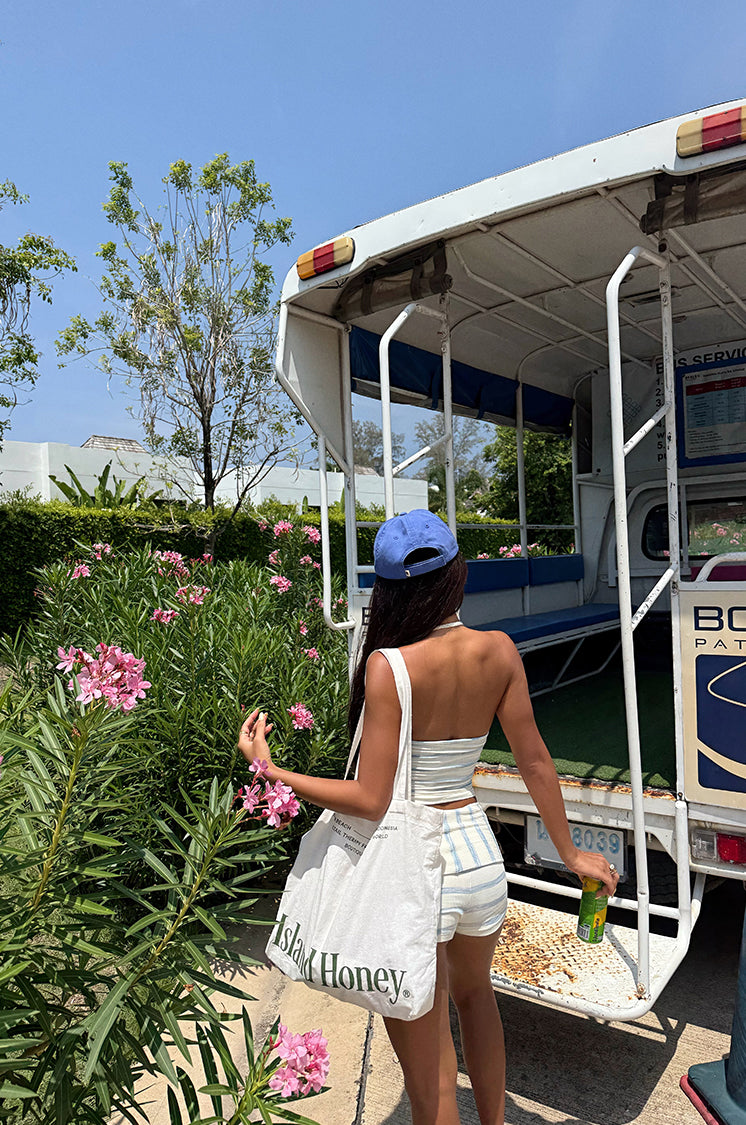 2025 BEARUN SWIM halter top and striped shorts swimsuit set in a beach resort style.