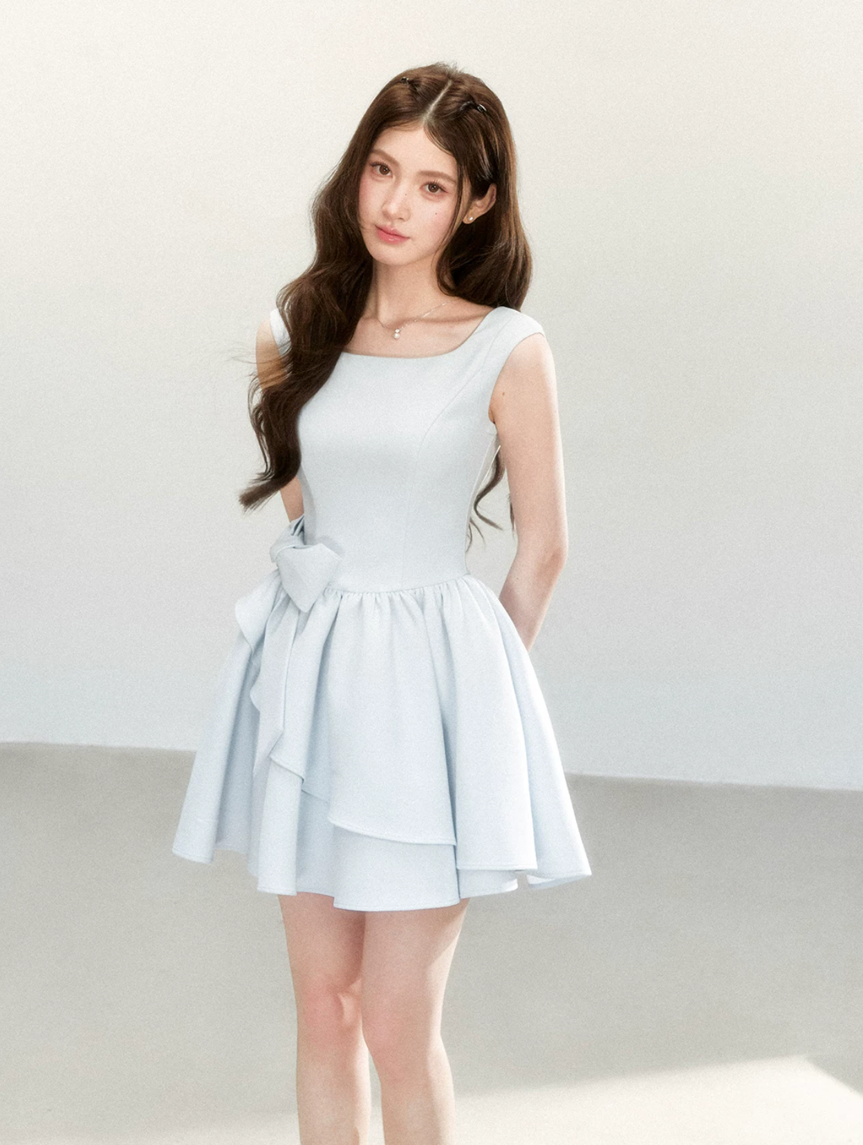 QDQD Sweet and feminine summer dress with bow design, slim waist and princess camisole style.