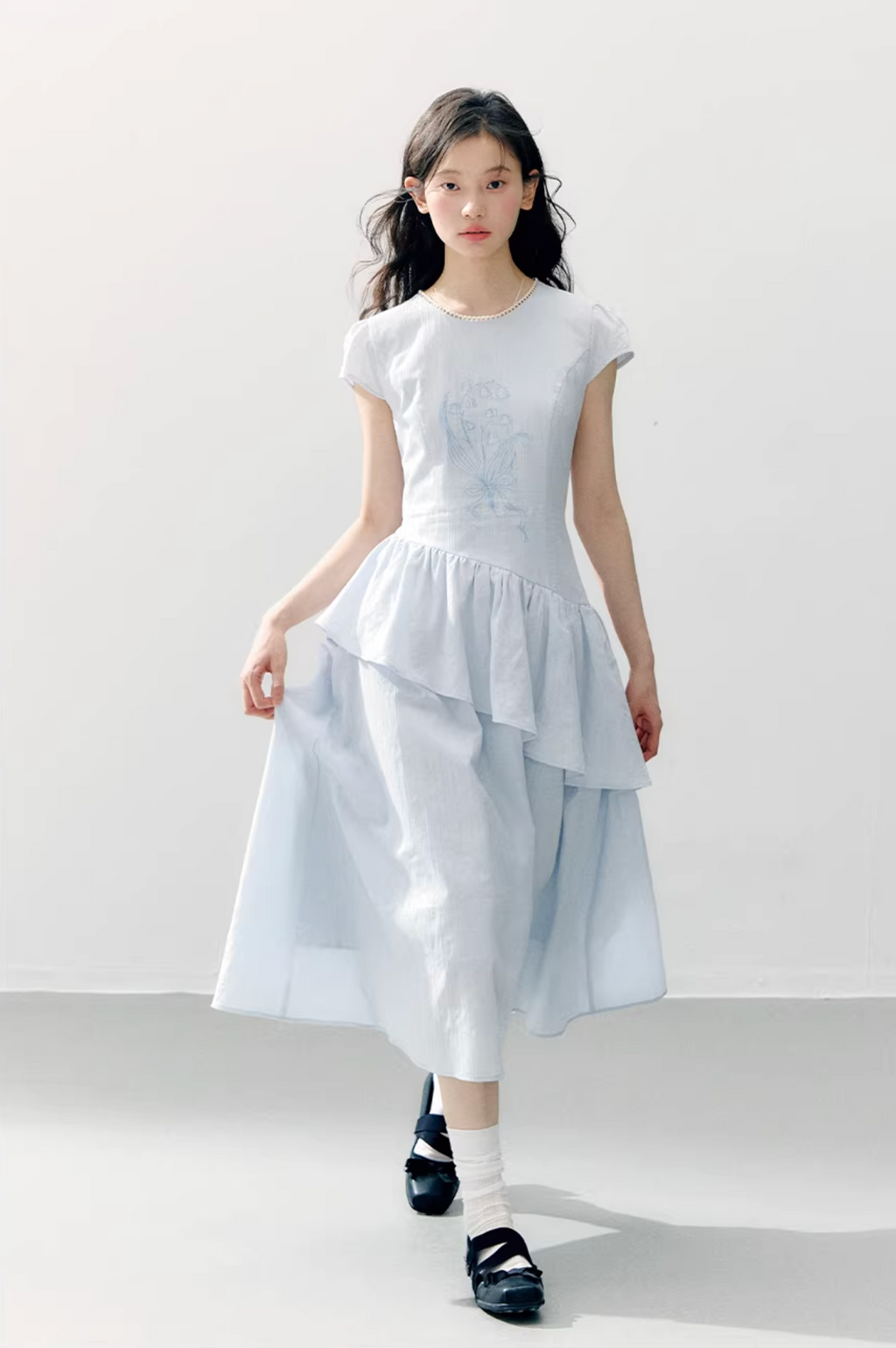 ANNATTO ANNATTO blue lily-of-the-valley short-sleeved dress with embroidered details, ruffle hem and fitted waist