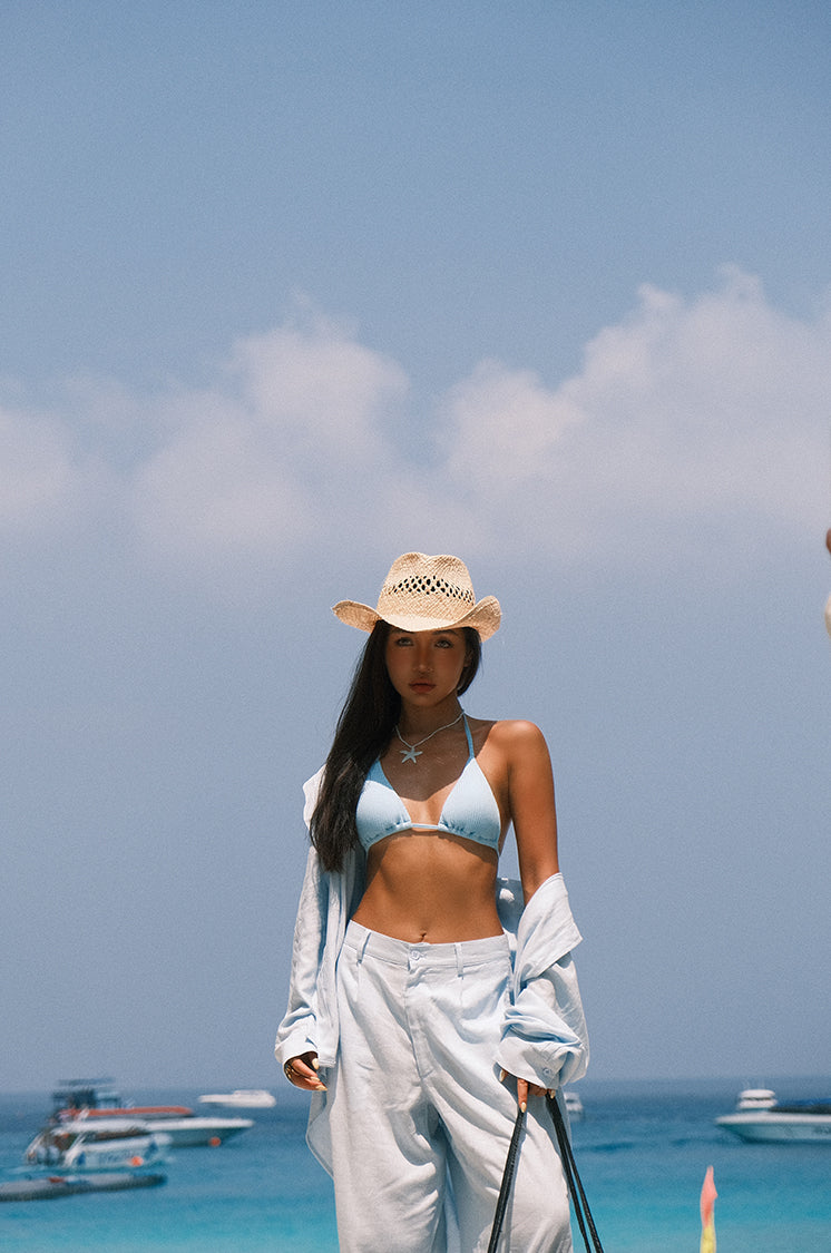 A loose and cool linen shirt and wide-leg pants set for women, perfect for a summer resort style in 2025. BEARUN SWIM