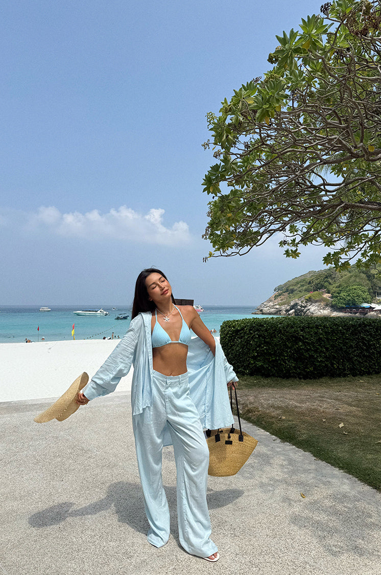 A loose and cool linen shirt and wide-leg pants set for women, perfect for a summer resort style in 2025. BEARUN SWIM