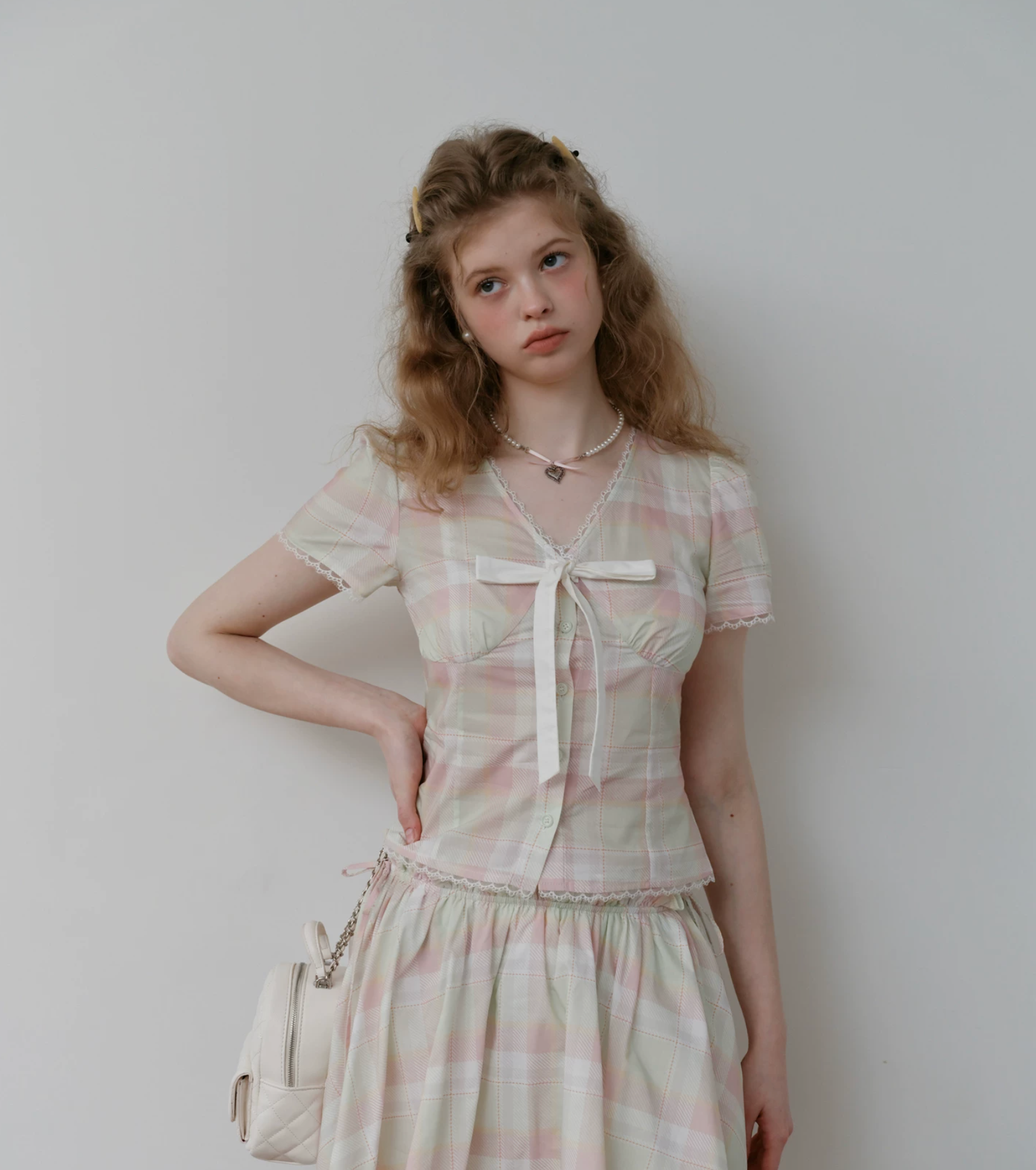 Preppy pink and green plaid 2026 Korean style suit includes V-neck short-sleeved shirt with lace trim and mini skirt