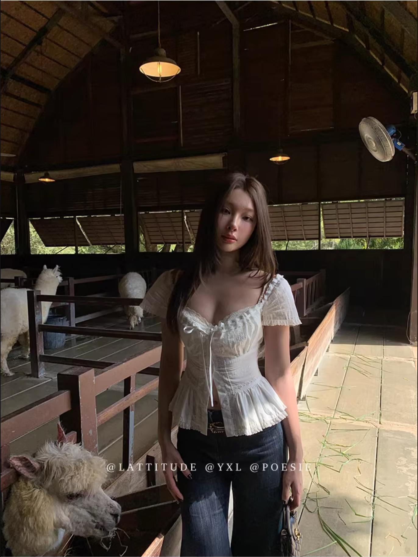 LATTITUDE White short-sleeved shirt with feminine hollow out lace trim.