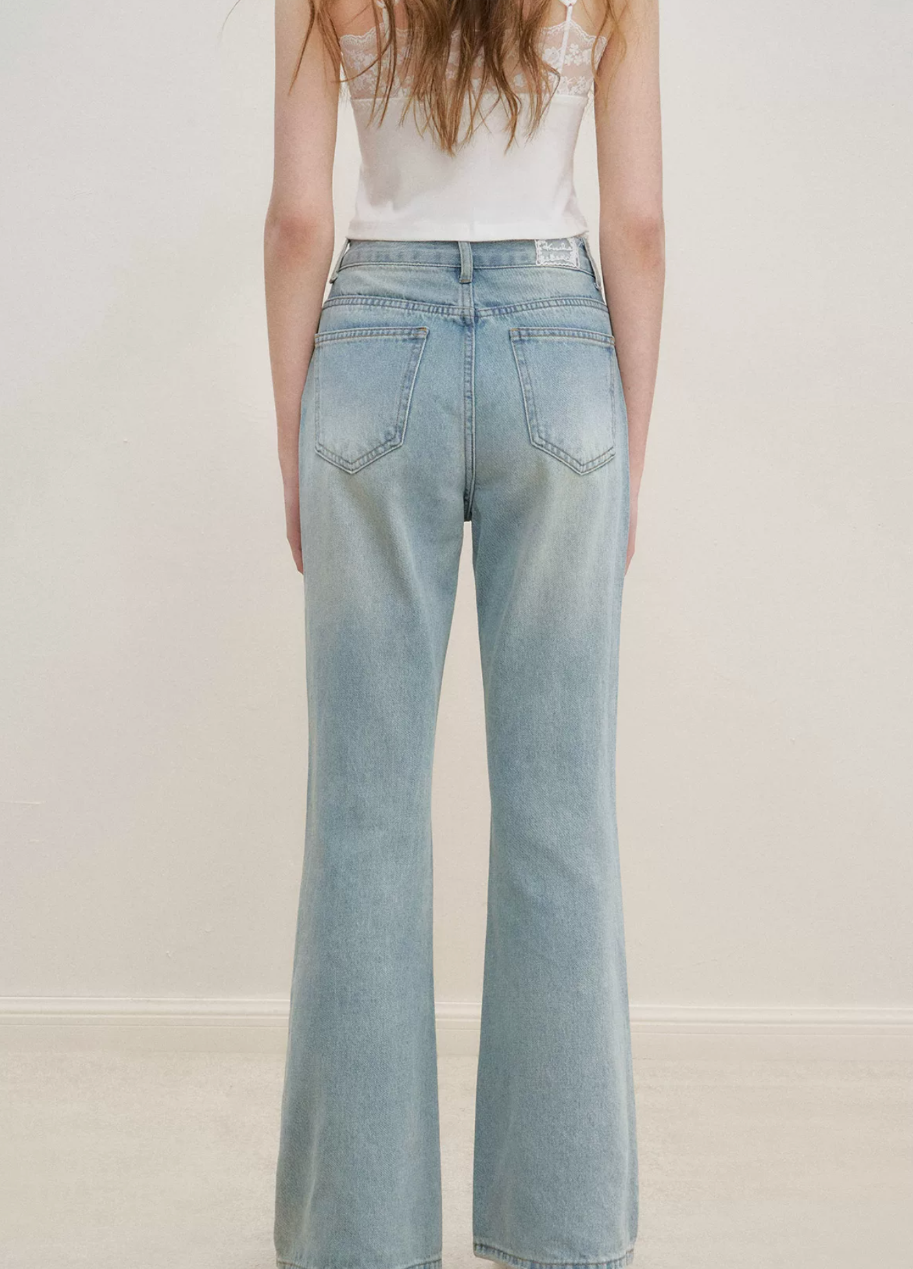 KROCHE Romantic French Lace Trim high-waisted flared jeans, worn by Ke Ying.