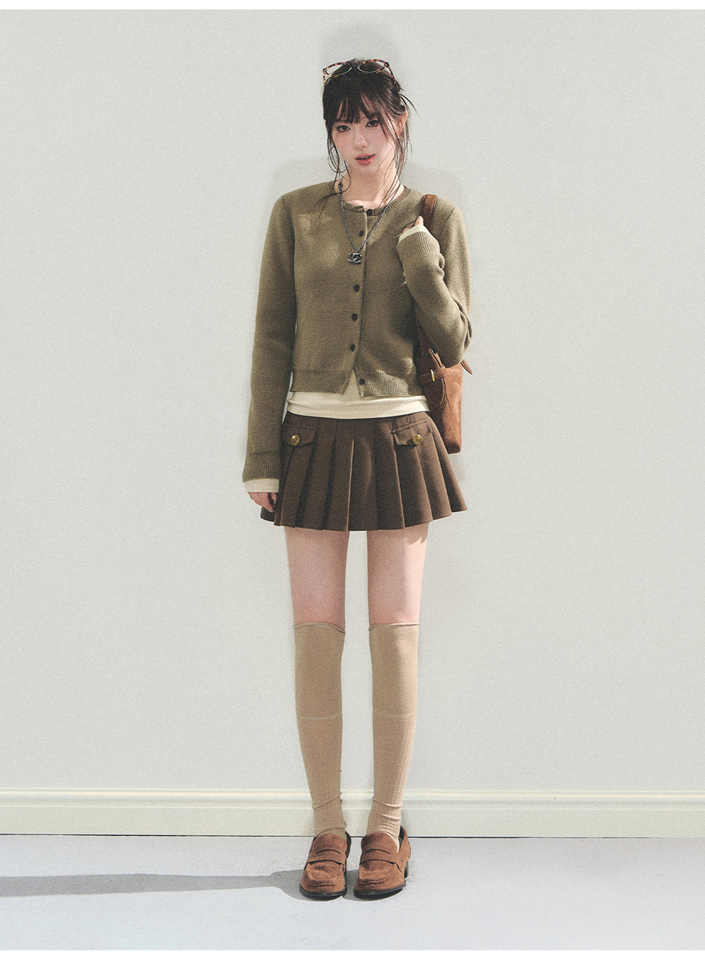 College style faux pocket skirt A-line pleated skirt high waisted mini skirt classic smart tight high end AD1 ANDYET