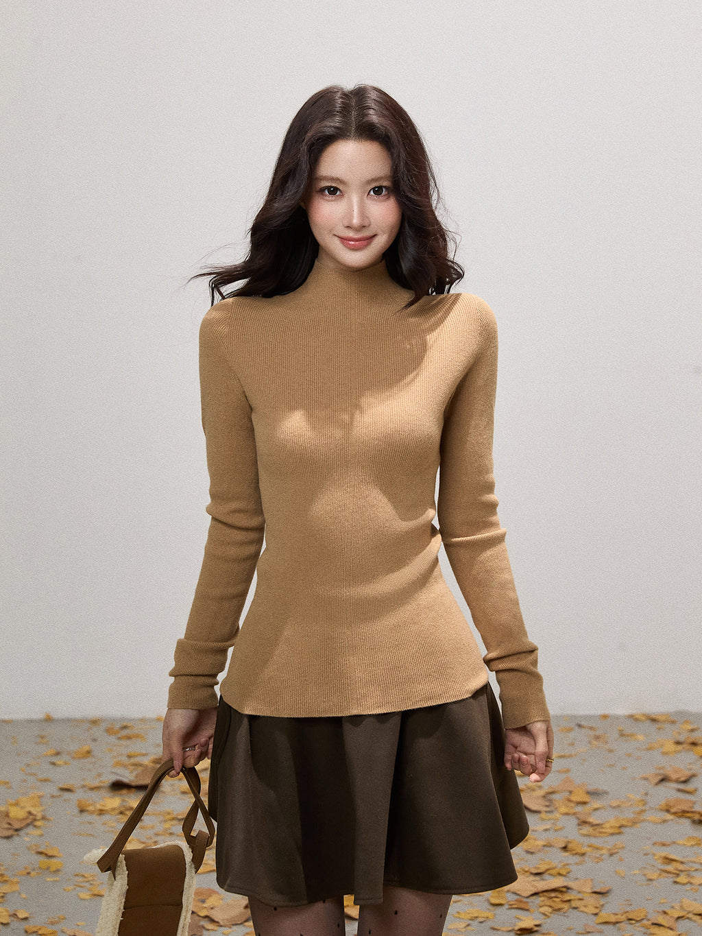 THEROUS Skin-colored knitted sweater, high neck, slim fit, a simple winter lining in Korean style.