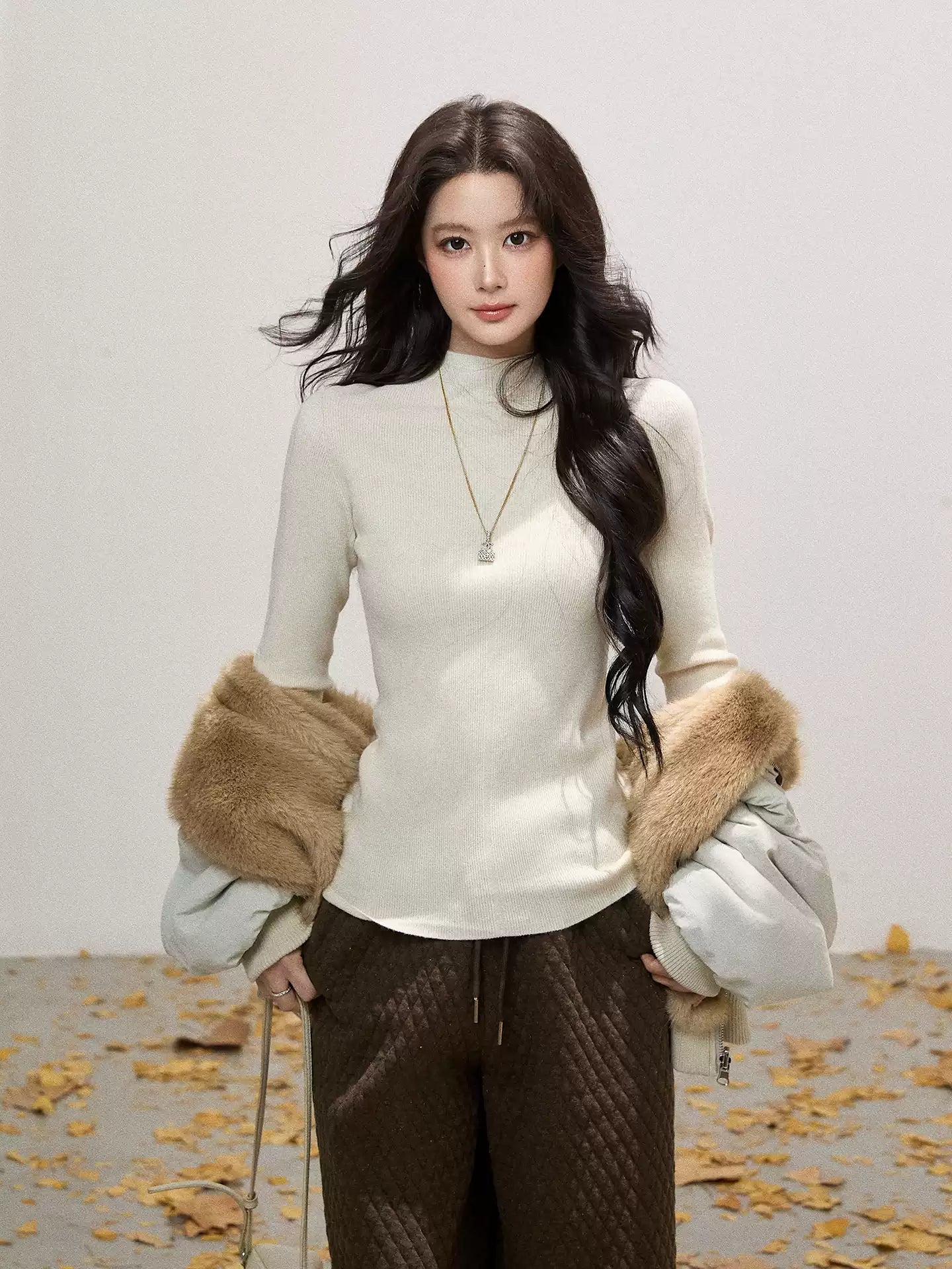 THEROUS Skin-colored knitted sweater, high neck, slim fit, a simple winter lining in Korean style.