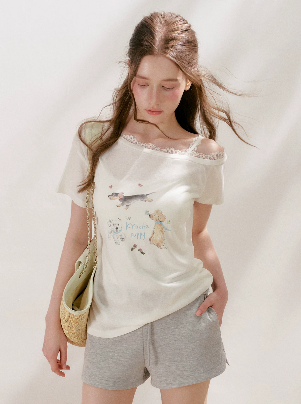 KROCHE Loose, off-the-shoulder short-sleeved T-shirt, puppy print, Lyocell material, French lace trim.