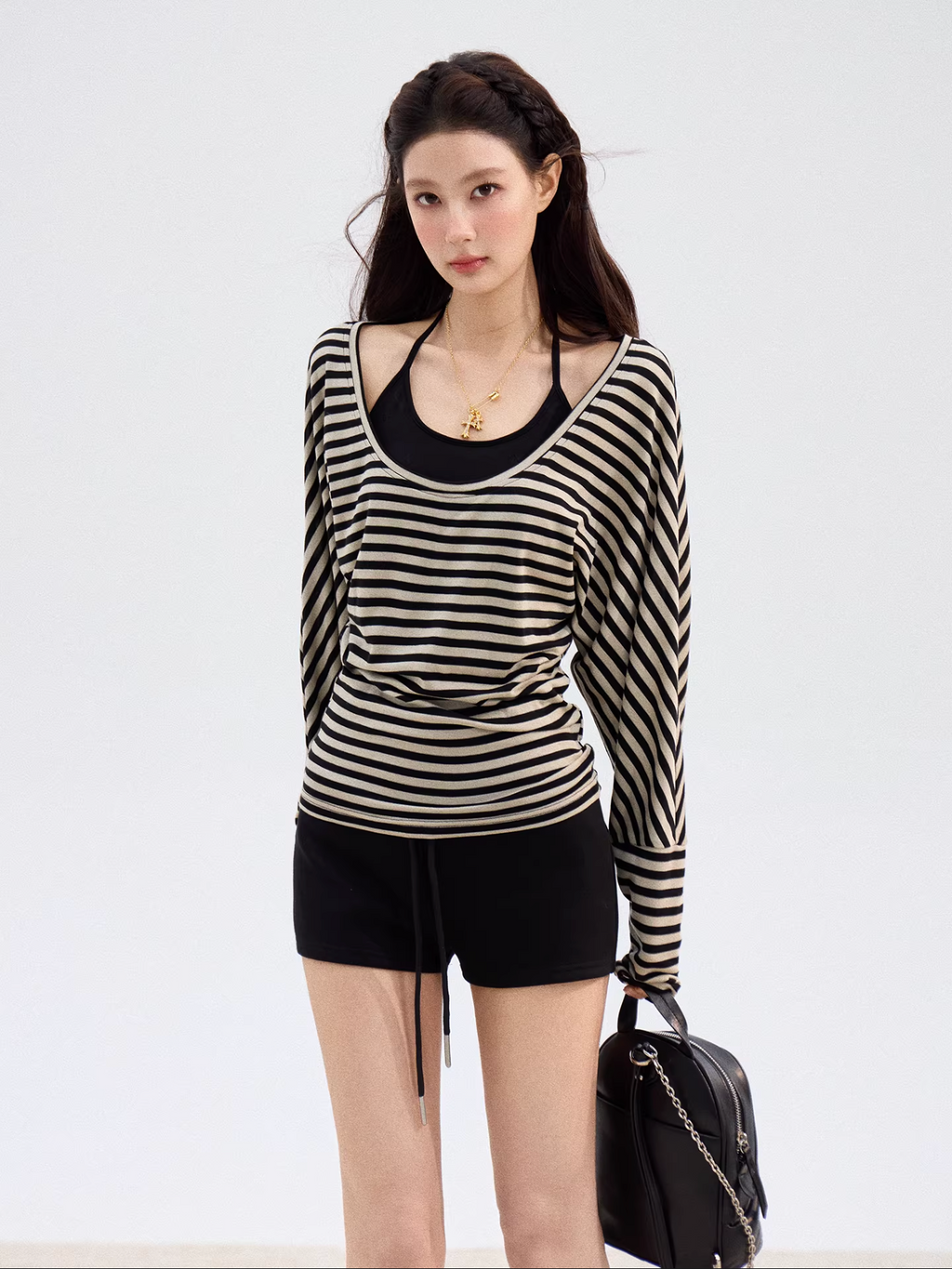 THEROUS Women's Xie Burou striped U-neck cardigan, spring style, comfortable, loose, casual, versatile.