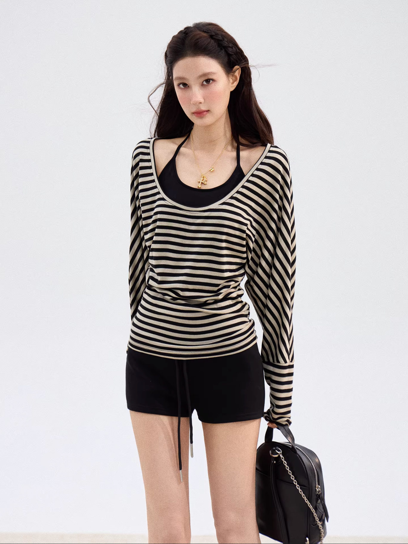 THEROUS Women's Xie Burou striped U-neck cardigan, spring style, comfortable, loose, casual, versatile.