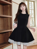A short, princess-style black tutu ballet dress reminiscent of Audrey Hepburn's Avenement.
