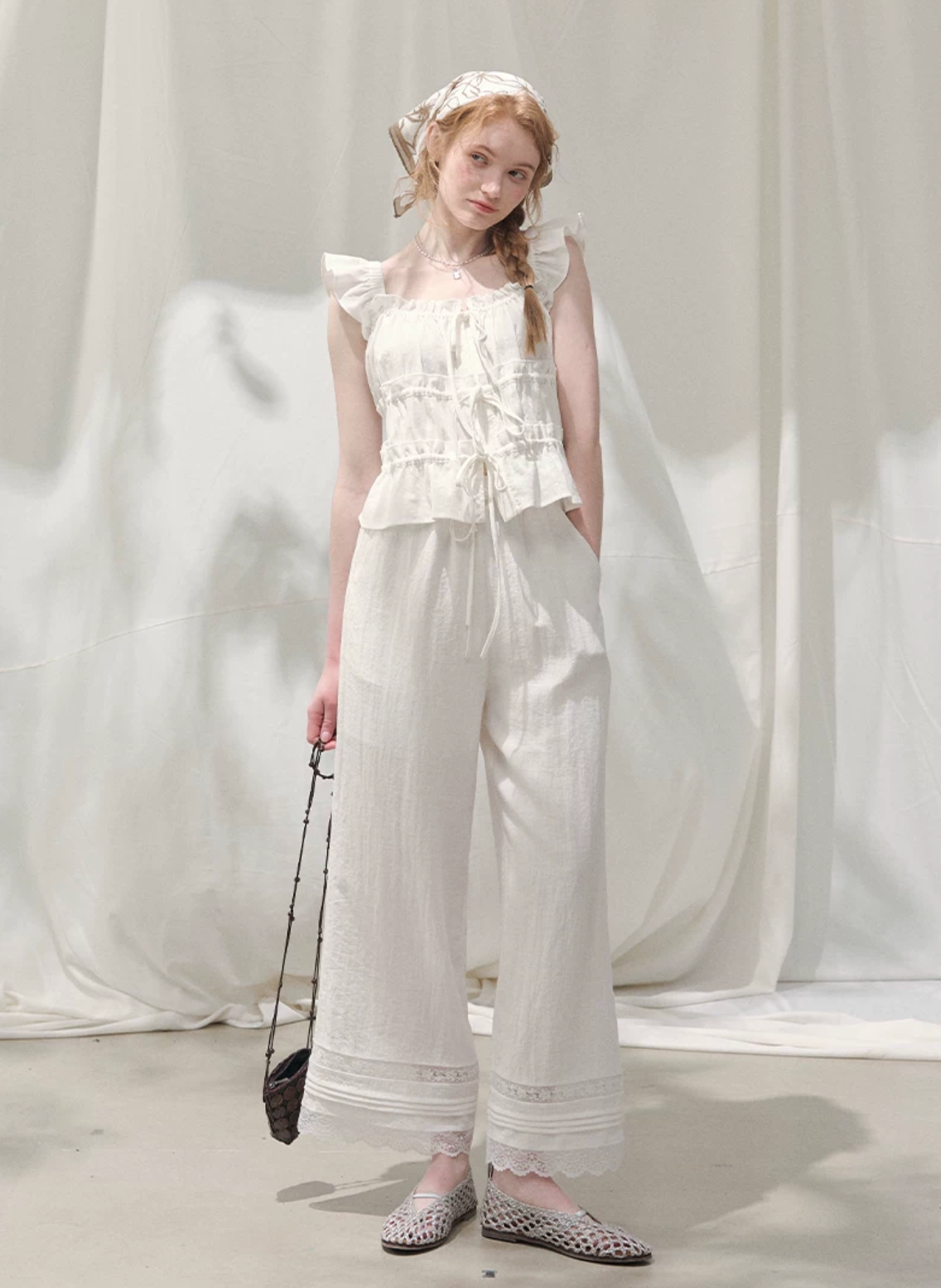 LOLOL "Dreamy Lace" white short-sleeved t-shirt with flutter sleeves - Elegant and fashionable design for women.