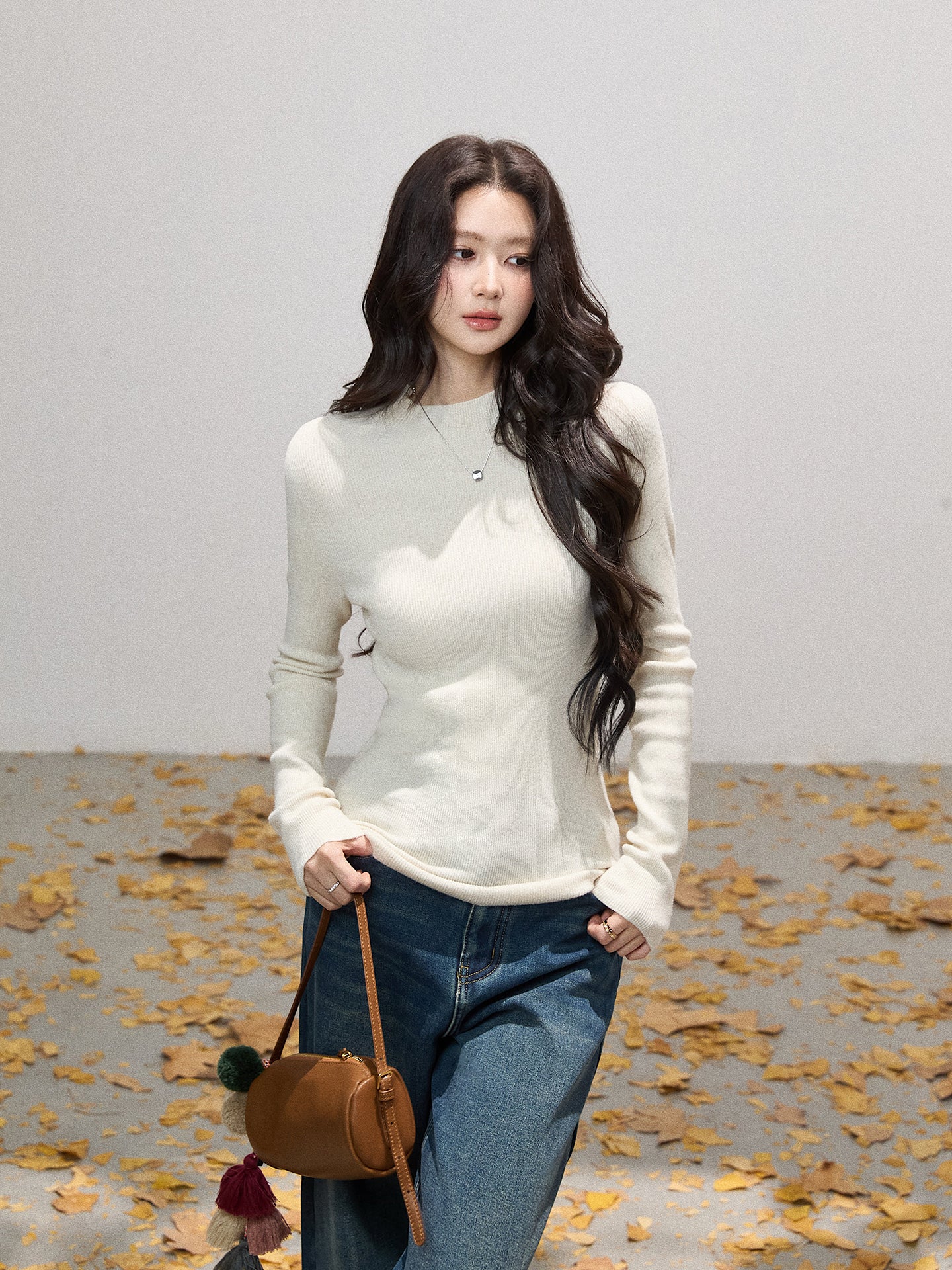 THEROUS Skin-colored knitted sweater, high neck, slim fit, a simple winter lining in Korean style.