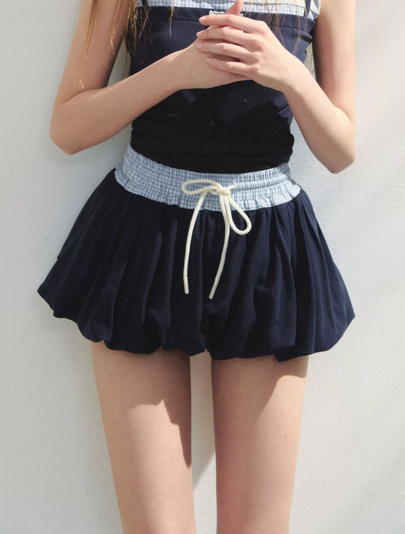 SUNSETPARK A playful, feminine lyocell tulip dress.