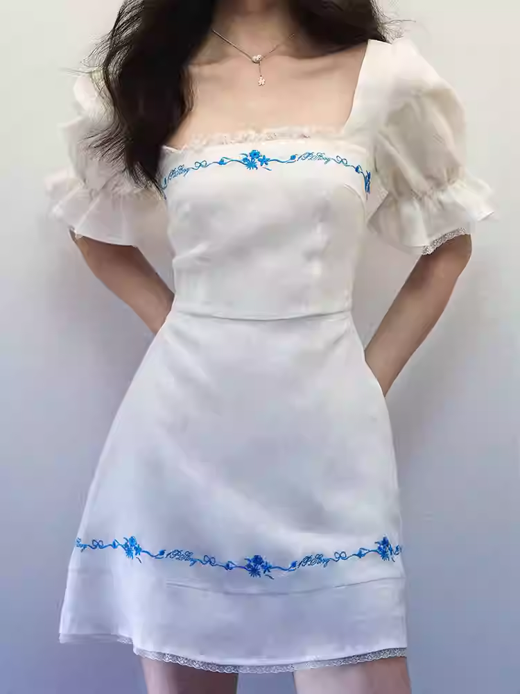 1PSTUDIO Women's white linen square-neck dress, spring/summer style; short-sleeved flared skirt in blue with embroidered pattern, body-hugging fit.