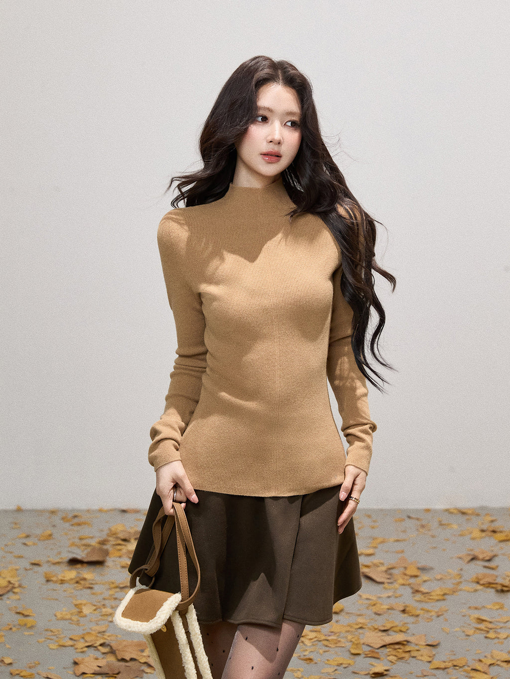 THEROUS Skin-colored knitted sweater, high neck, slim fit, a simple winter lining in Korean style.
