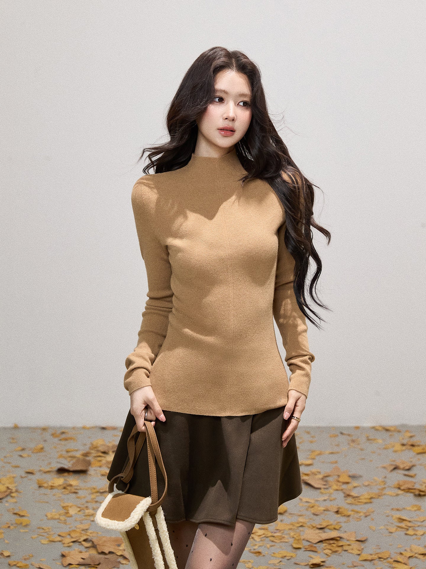 THEROUS Skin-colored knitted sweater, high neck, slim fit, a simple winter lining in Korean style.