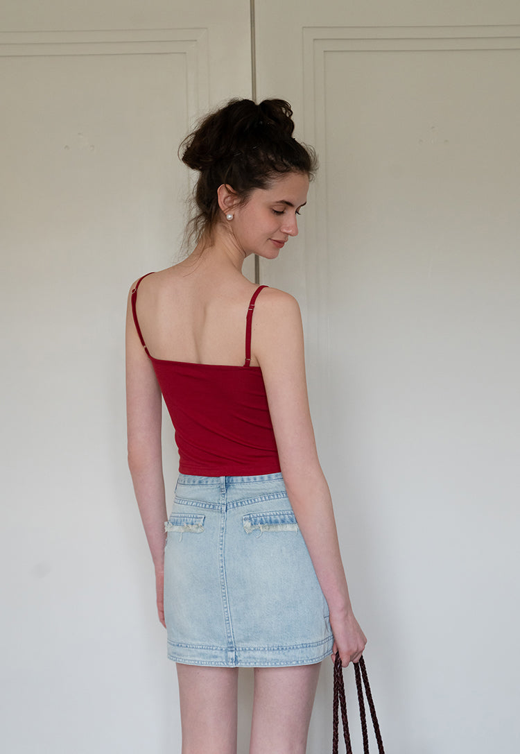 3D rose pleated camisole can be worn alone or with a slim-fit Eggka Cardigan