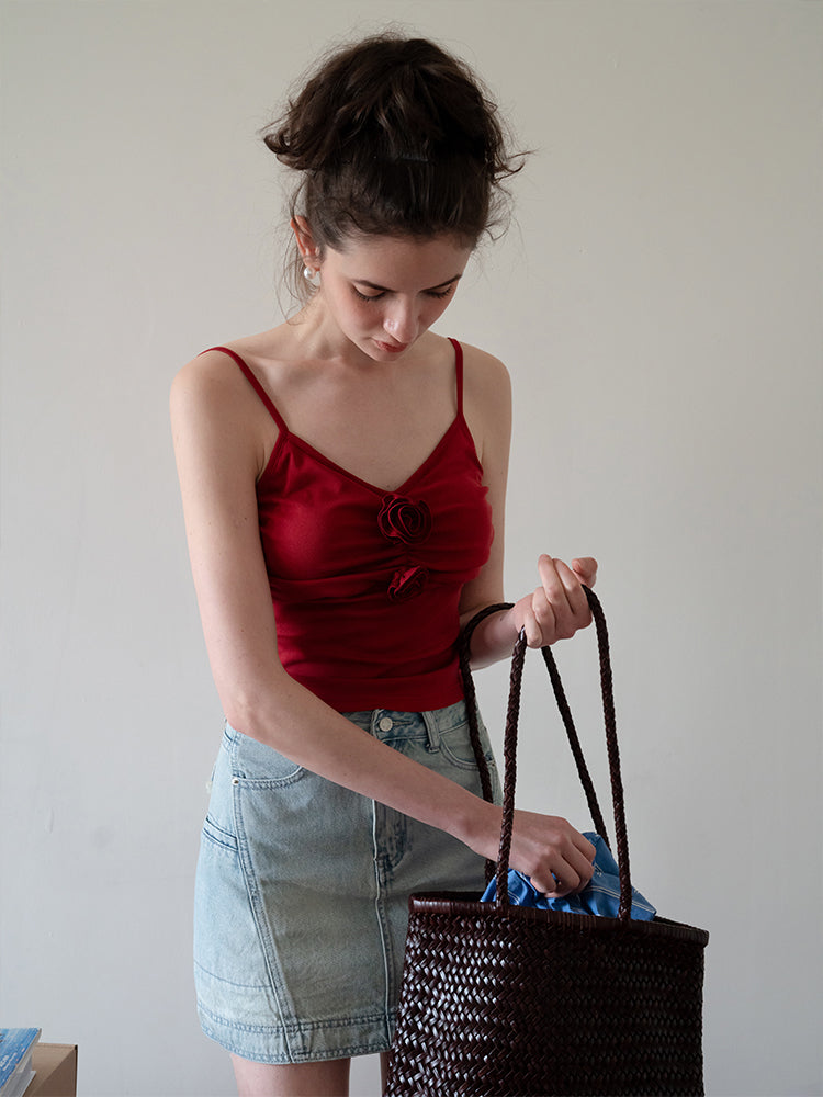 3D rose pleated camisole can be worn alone or with a slim-fit Eggka Cardigan