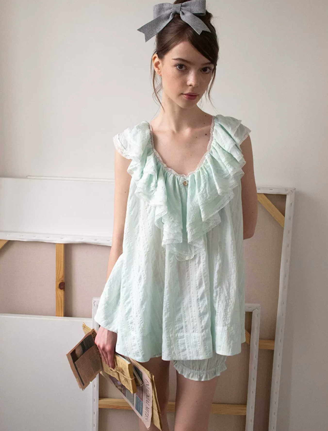 MineBeThyVers Loose-fitting ruffled layered lace mint green suit and pumpkin shorts.