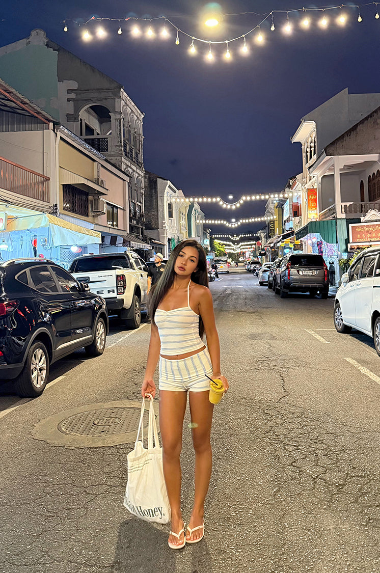 2025 BEARUN SWIM halter top and striped shorts swimsuit set in a beach resort style.