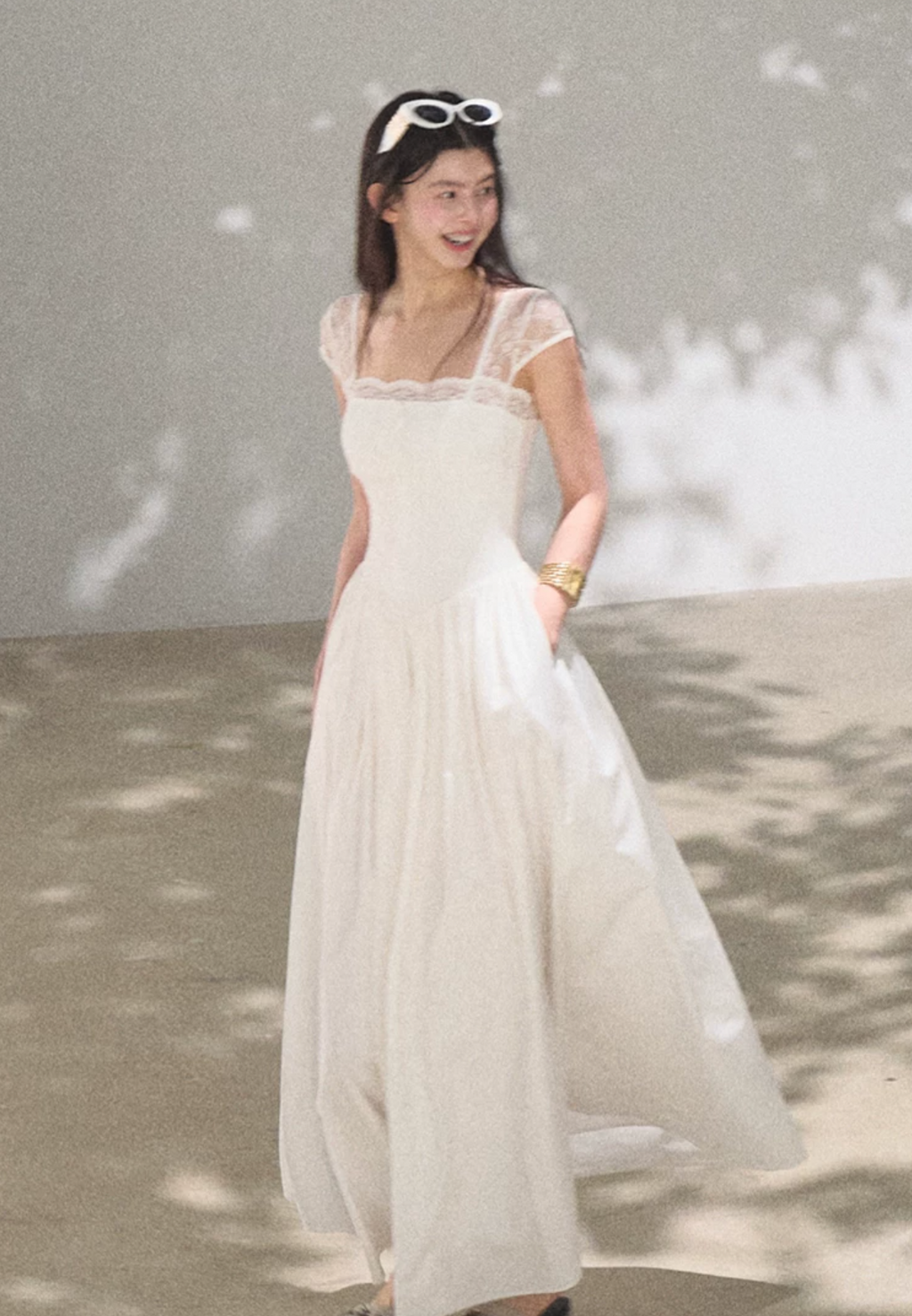 OAKMOO "Gently Pick Up" beach resort style lace slip dress with a waist-hugging skirt.