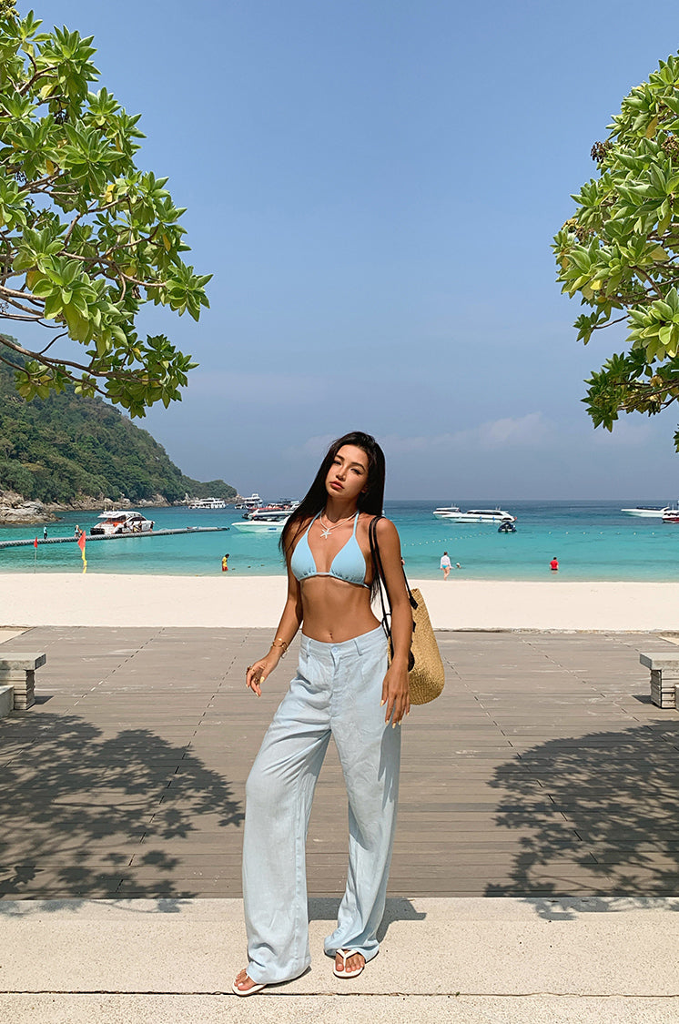 A loose and cool linen shirt and wide-leg pants set for women, perfect for a summer resort style in 2025. BEARUN SWIM