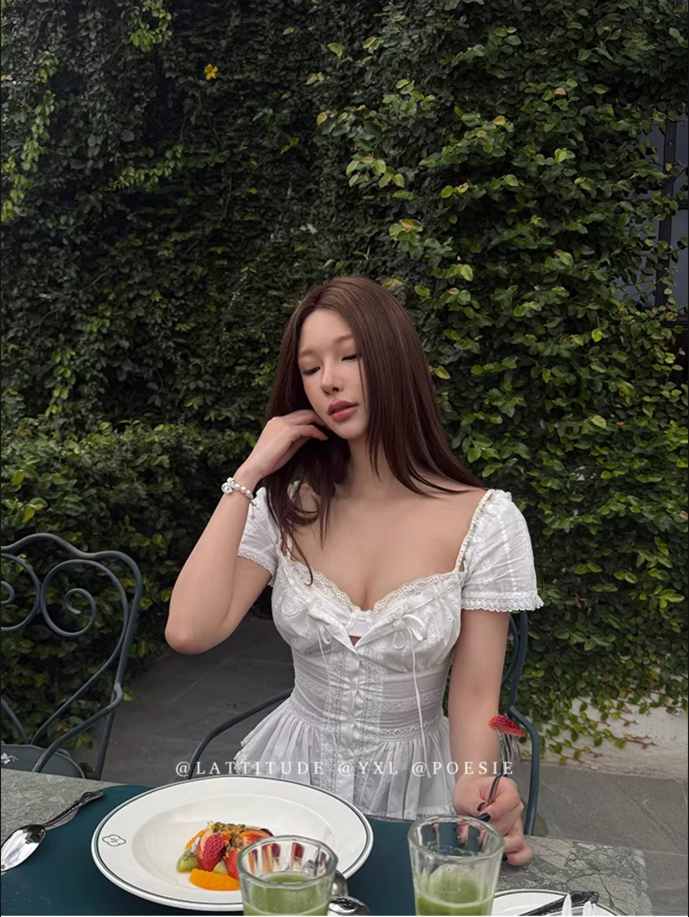 LATTITUDE White short-sleeved shirt with feminine hollow out lace trim.
