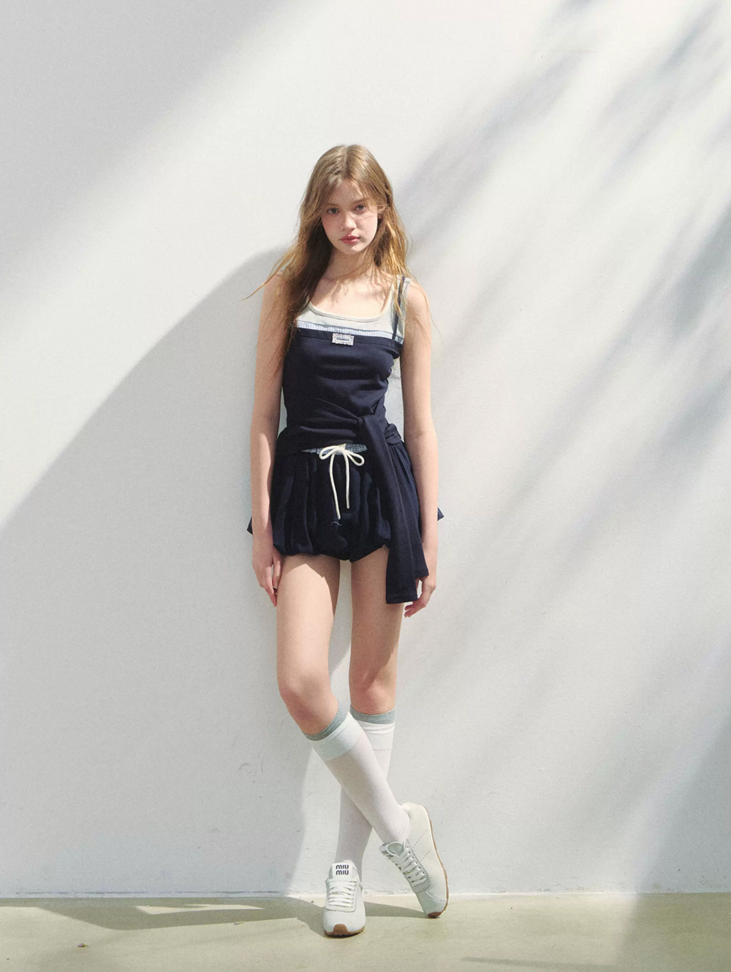 SUNSETPARK A playful, feminine lyocell tulip dress.
