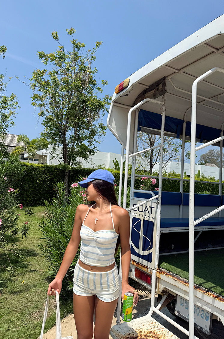 2025 BEARUN SWIM halter top and striped shorts swimsuit set in a beach resort style.