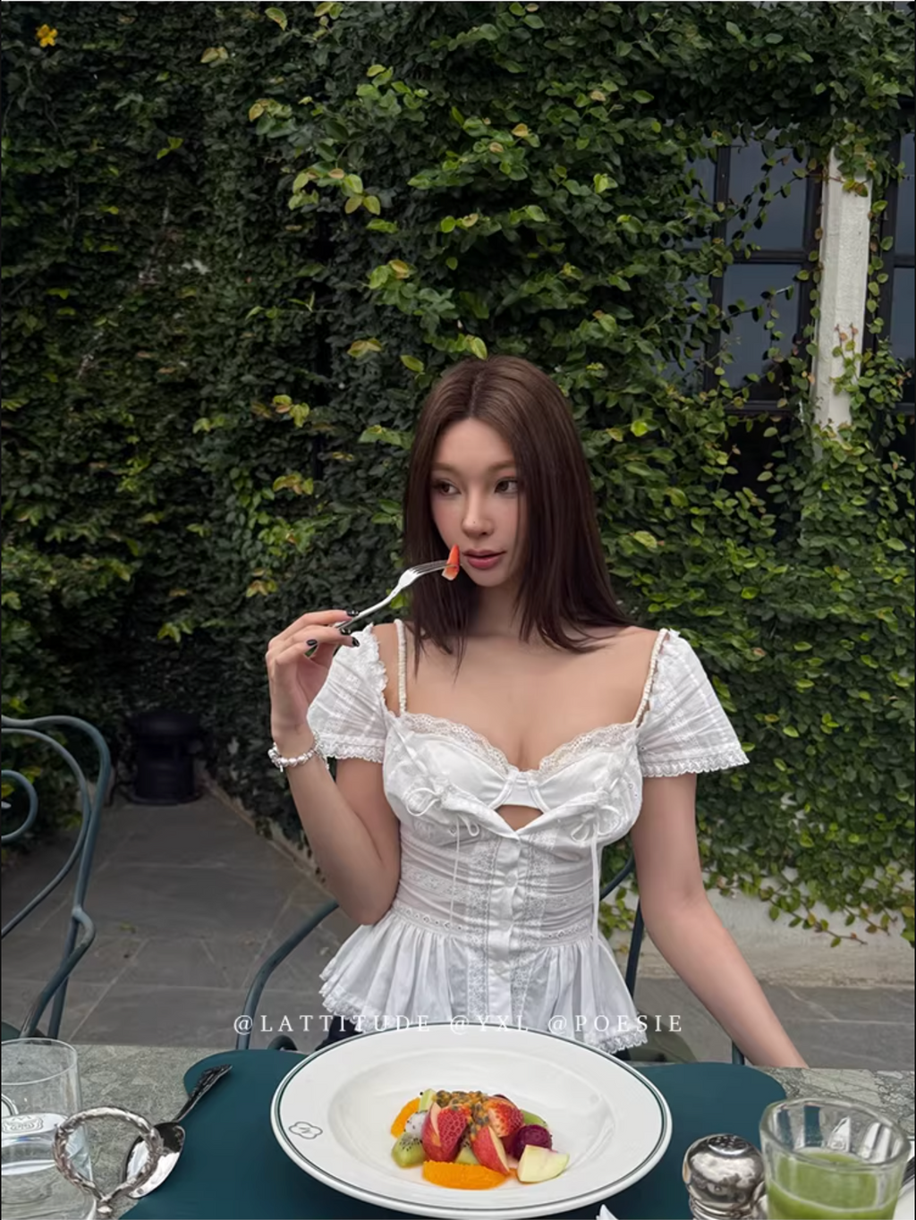 LATTITUDE White short-sleeved shirt with feminine hollow out lace trim.
