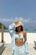 A loose and cool linen shirt and wide-leg pants set for women, perfect for a summer resort style in 2025. BEARUN SWIM