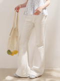 KROCHE "100% Cotton" slim-fit flared jeans, mixed colors, hand-embroidered with five-petal flower pattern, white.