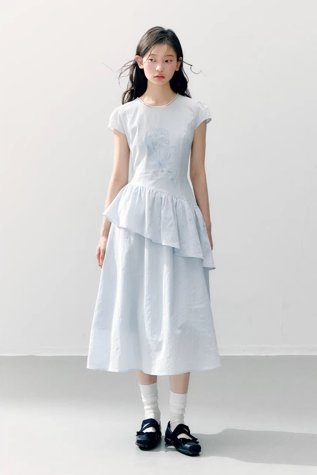 ANNATTO ANNATTO blue lily-of-the-valley short-sleeved dress with embroidered details, ruffle hem and fitted waist