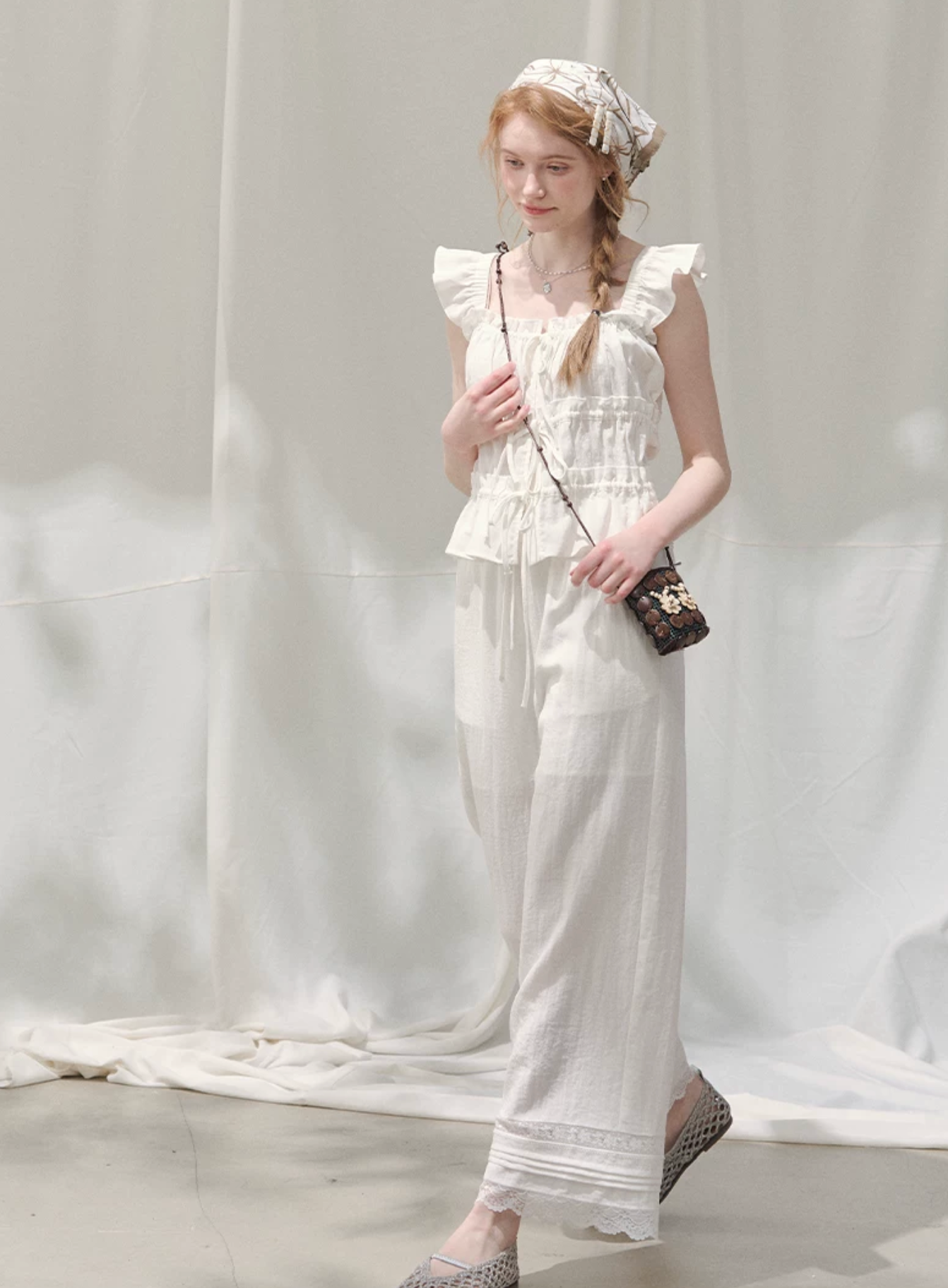 LOLOL "Dreamy Lace" white short-sleeved t-shirt with flutter sleeves - Elegant and fashionable design for women.