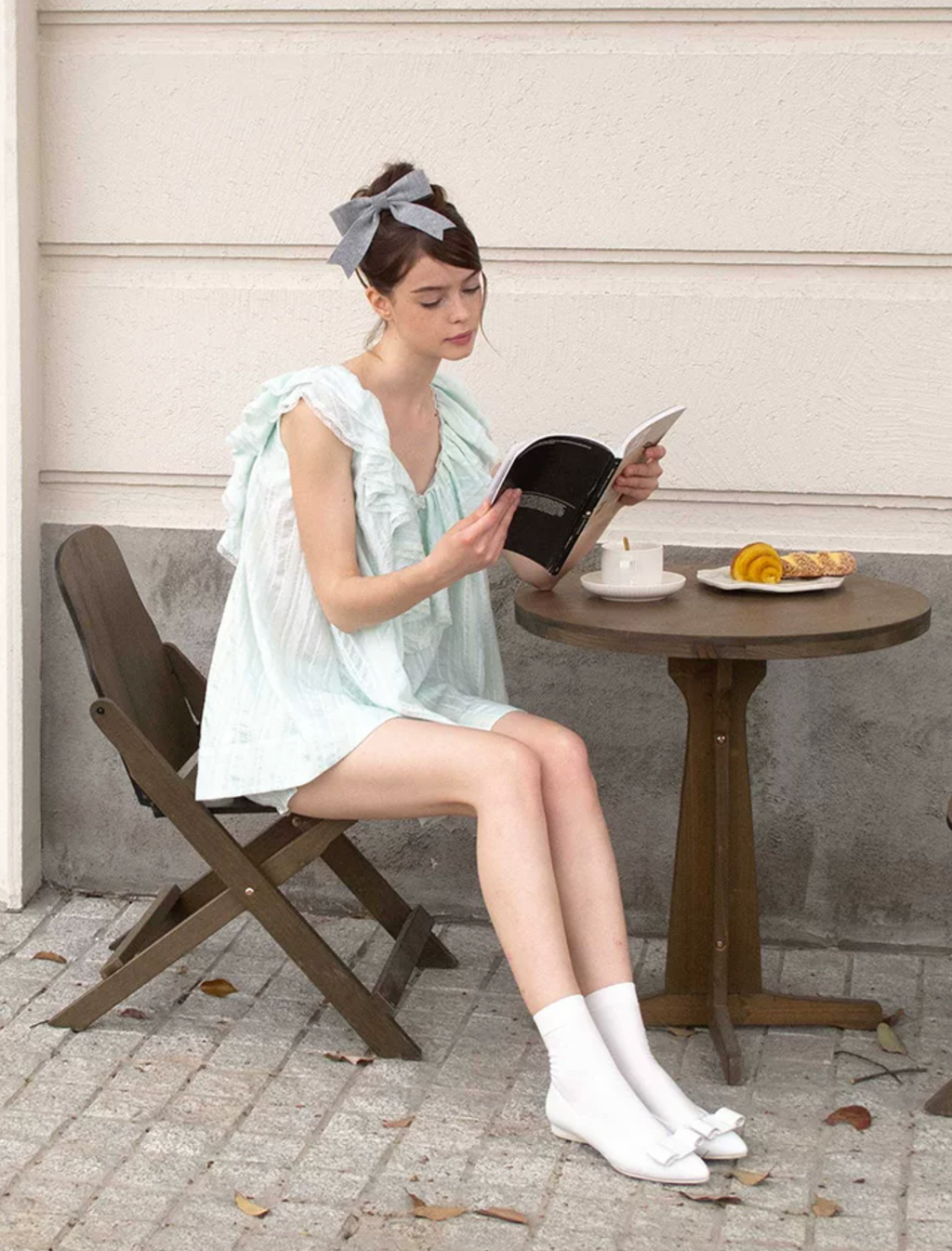 MineBeThyVers Loose-fitting ruffled layered lace mint green suit and pumpkin shorts.