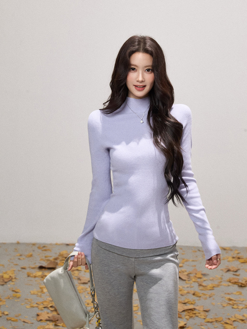 THEROUS Skin-colored knitted sweater, high neck, slim fit, a simple winter lining in Korean style.