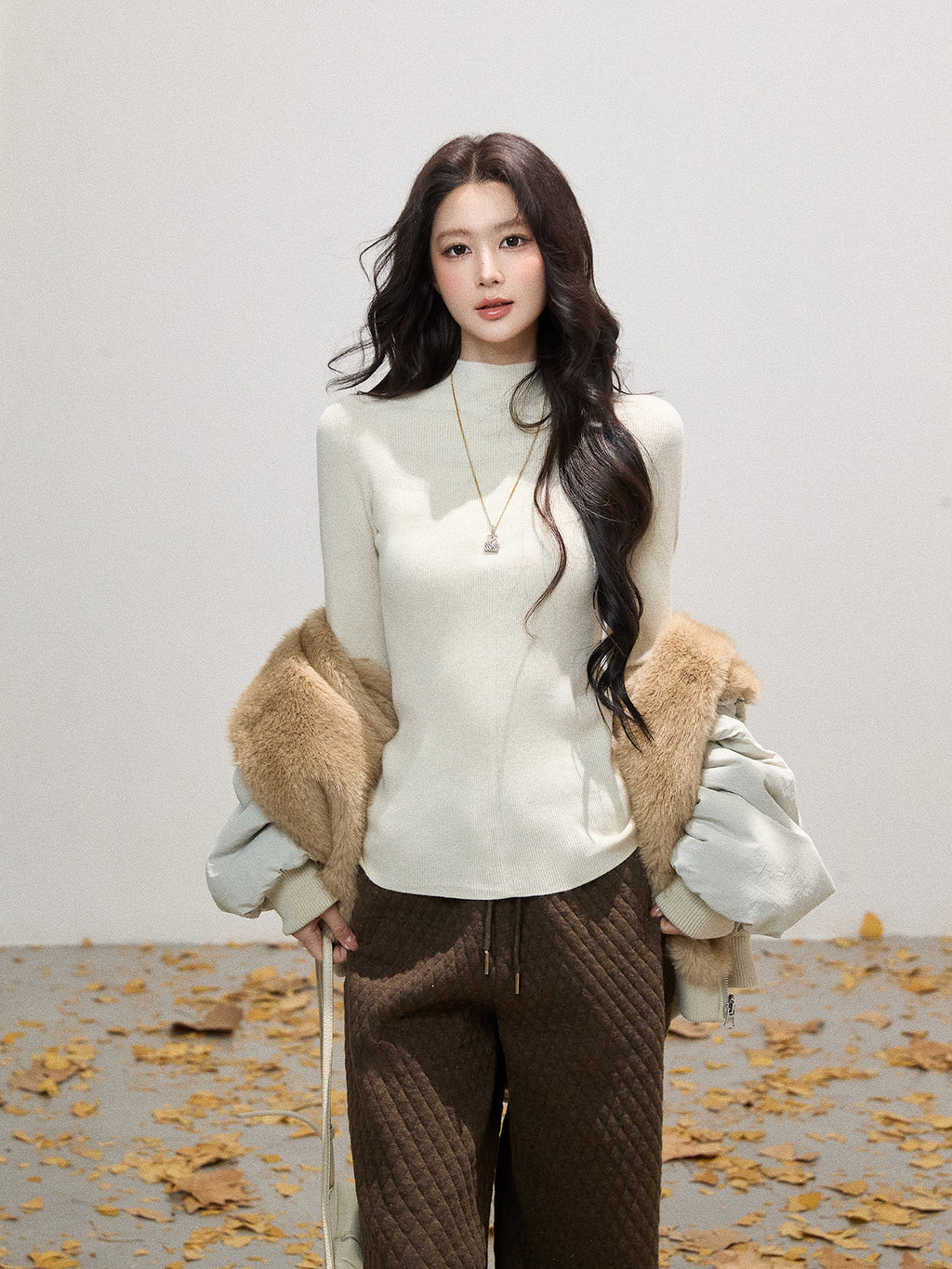 THEROUS Skin-colored knitted sweater, high neck, slim fit, a simple winter lining in Korean style.