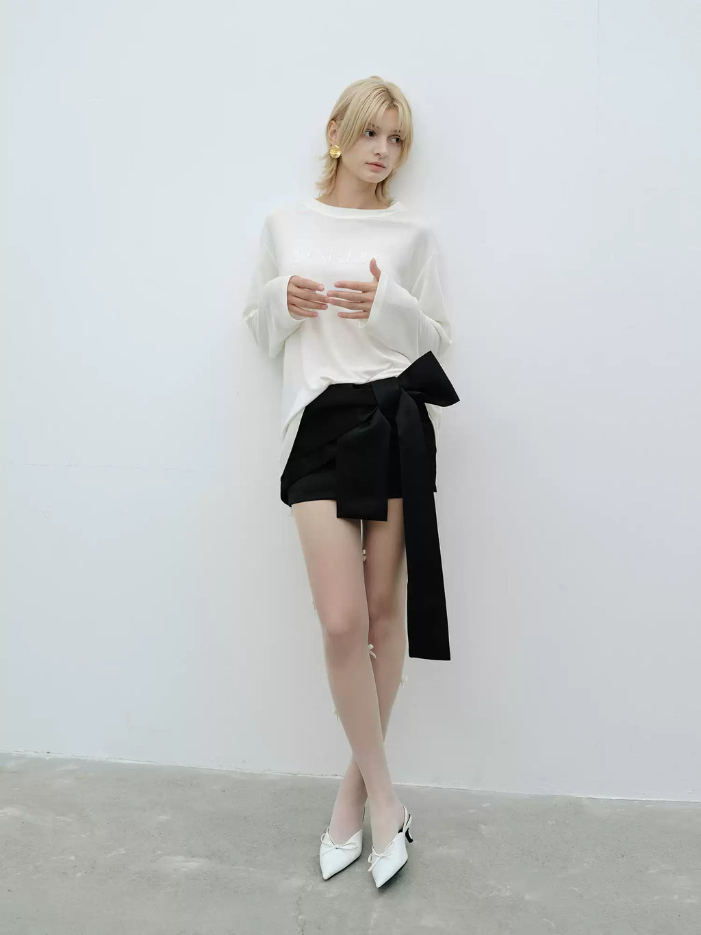 AWEAR High-end three-dimensional satin skirt with big bow, black bodycon skirt