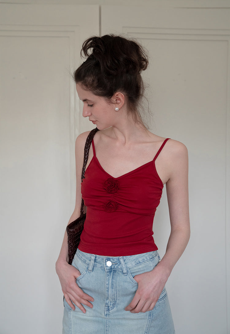 3D rose pleated camisole can be worn alone or with a slim-fit Eggka Cardigan