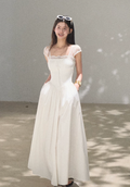 OAKMOO "Gently Pick Up" beach resort style lace slip dress with a waist-hugging skirt.