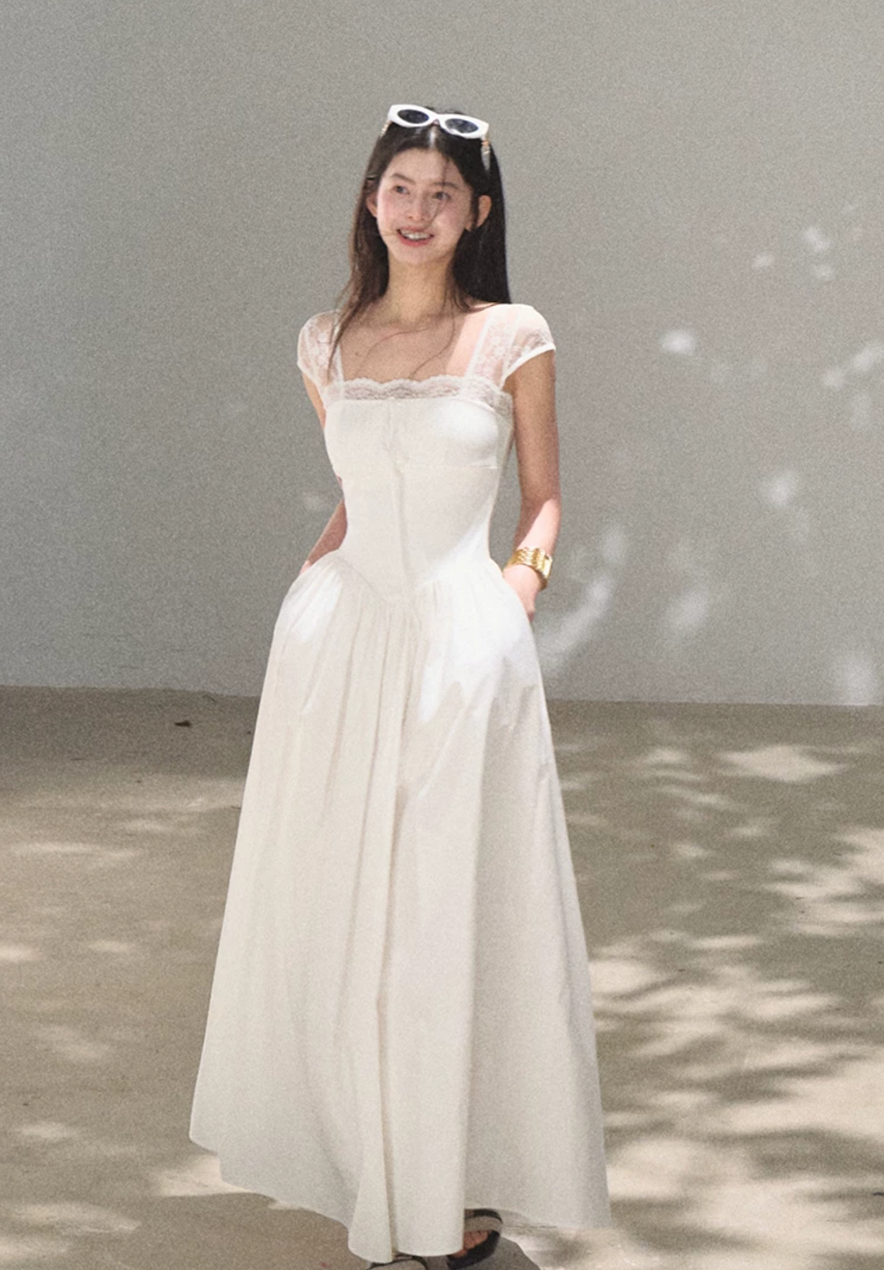 OAKMOO "Gently Pick Up" beach resort style lace slip dress with a waist-hugging skirt.